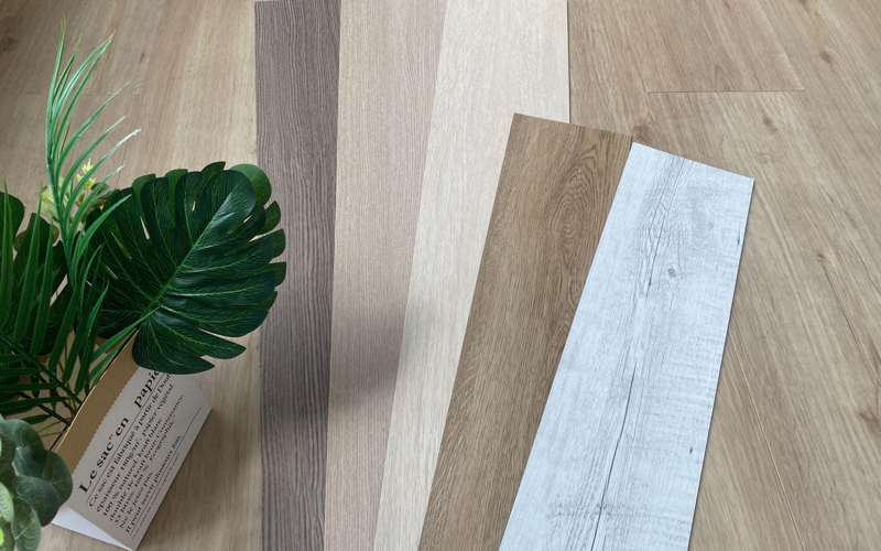 Various wood grain floorings, from light to dark brown.