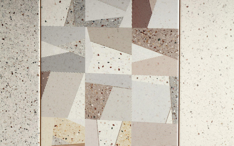 Terrazzo-effect vinyl looks like tile and has a textured surface with beautiful patterns.