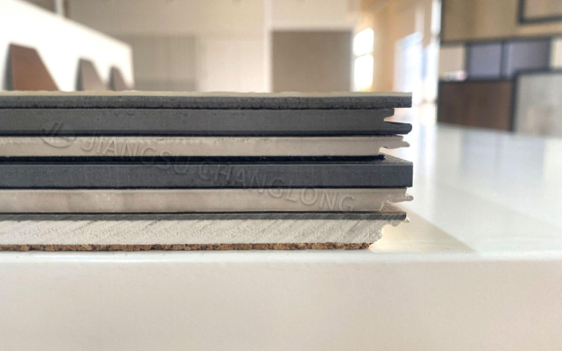 CHANGLONG vinyl flooring planks in 6 styles and thicknesses stacked vertically
